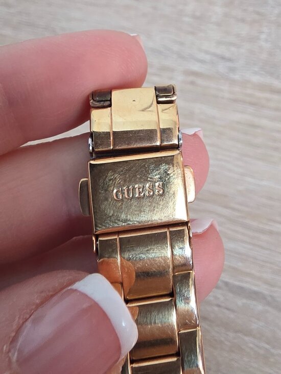 Guess Women\'s 27mm rose gold-tone stainless steel watch w/rhinestone bezel main image 4